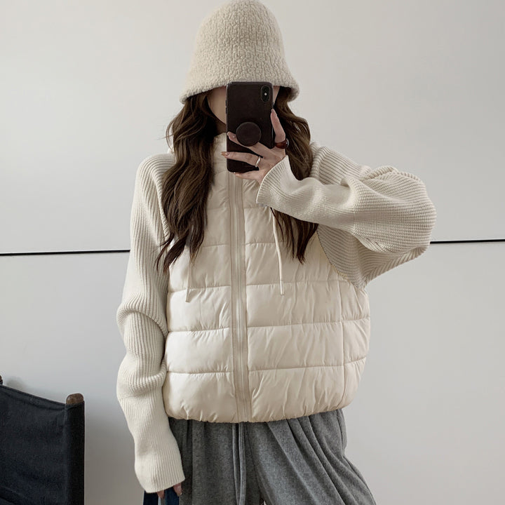 Short ladies' padded jacket with knitted sleeves and hood