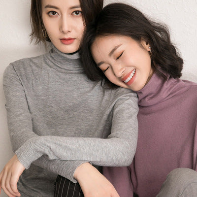Women’s knitted sweater, stand-up collar, loose fit