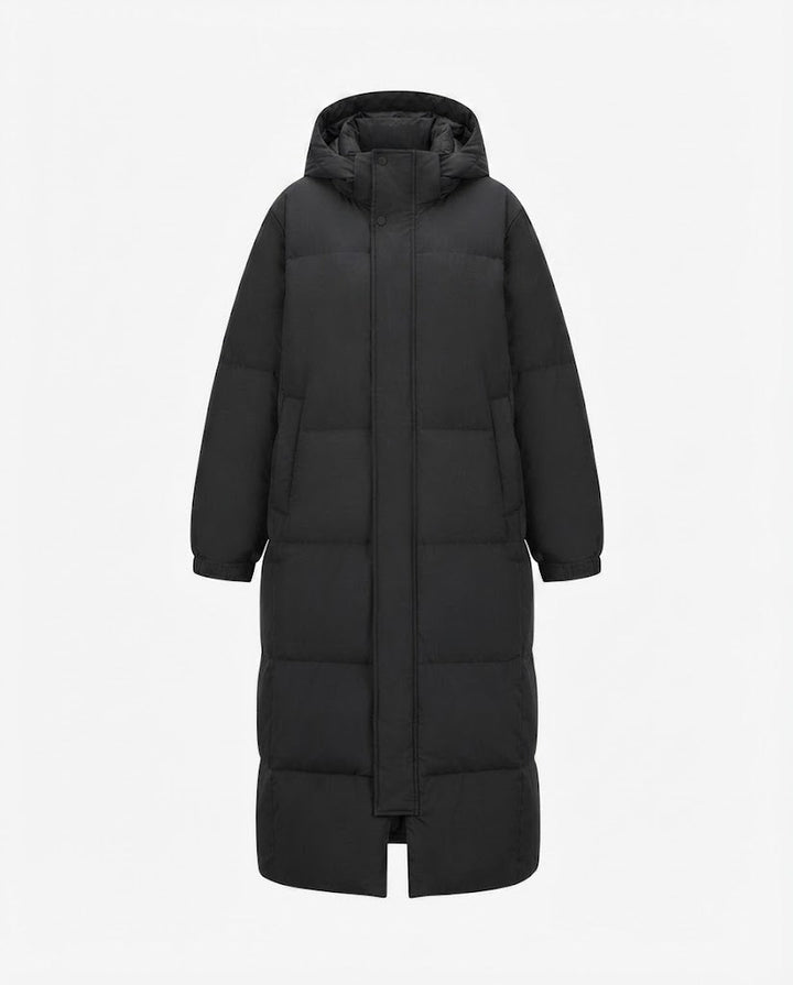 Women’s longer cold blocker puffer coat with walking slit, high closing collar and noise-reducing outer material