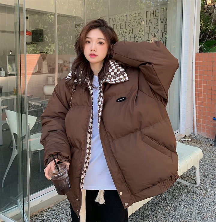 Short women's quilted jacket with stand-up collar