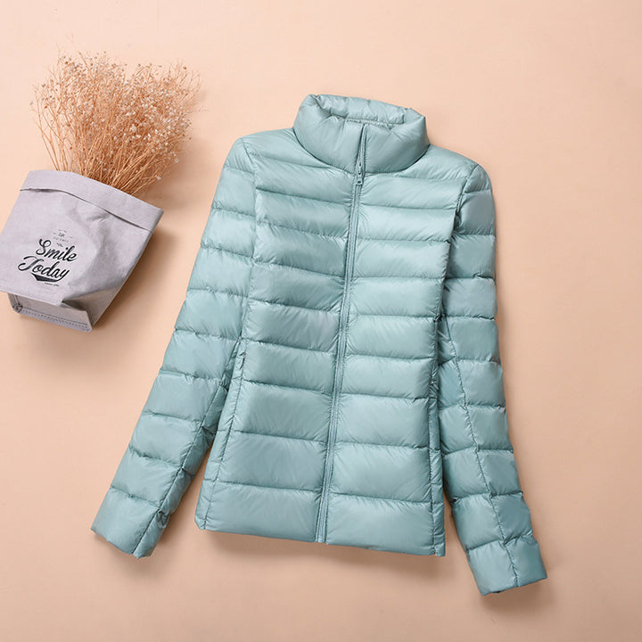 Light women's down jacket, short, with white duck down