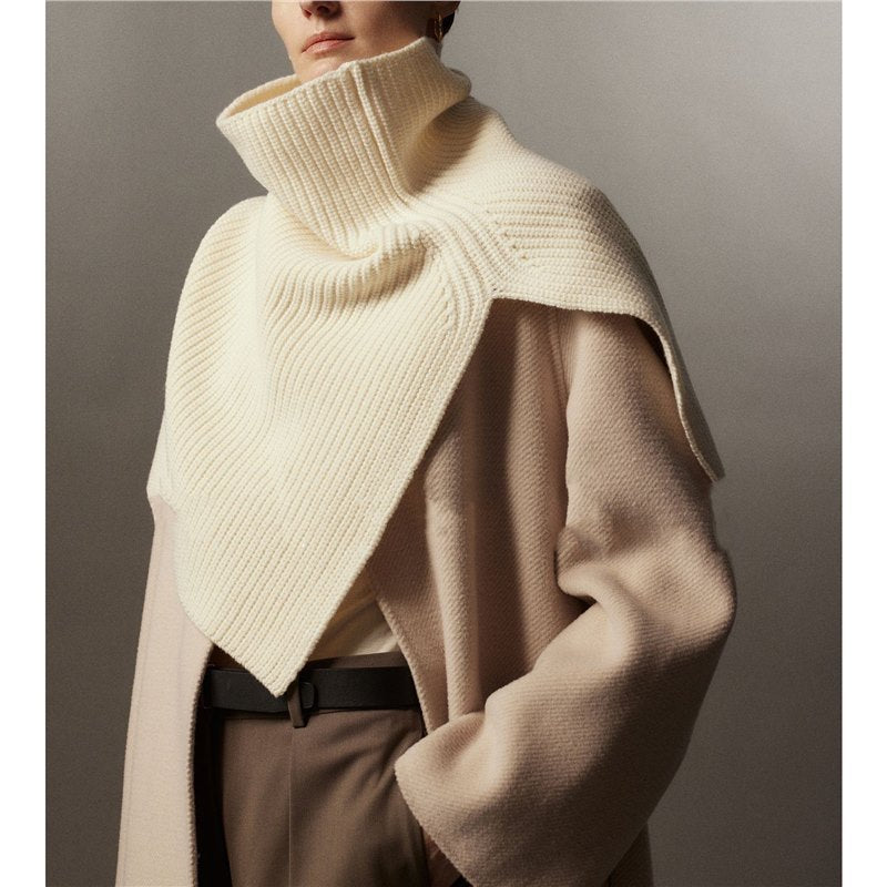 Knitted shoulder warmer made of merino wool with slit