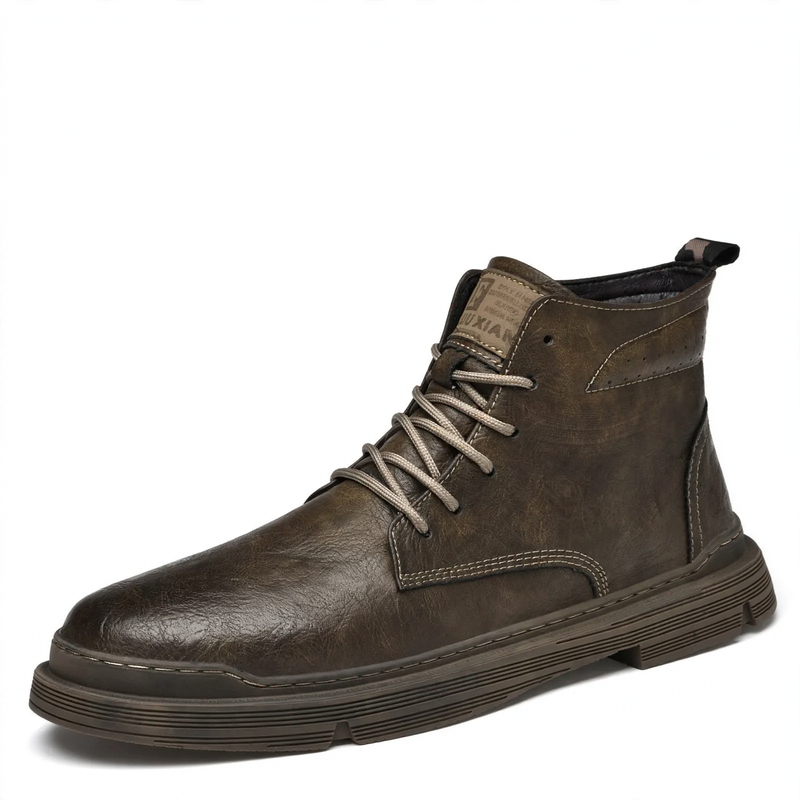 Padded men's leather boots with decorative stitching