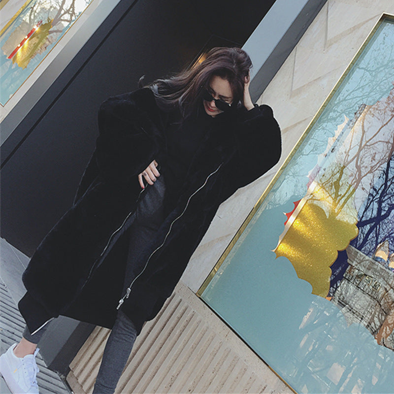 Long women's faux fur coat with hood