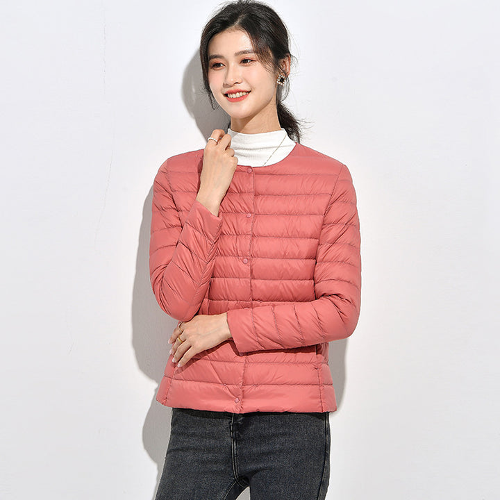 Light women's down jacket, short, as a base layer jacket