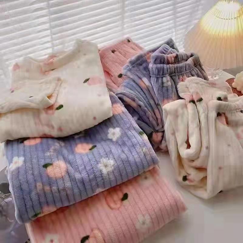 Fluffy coral fleece pajamas with bear motif