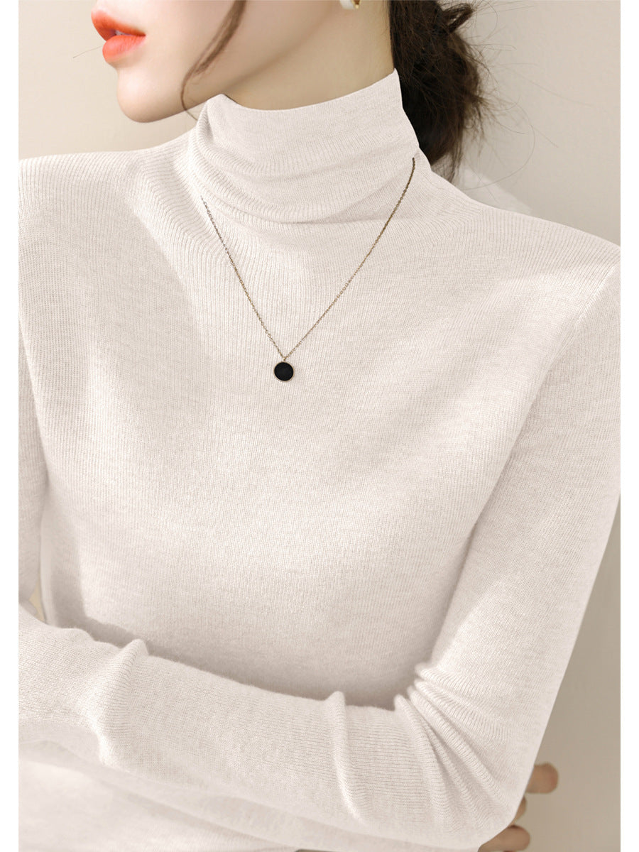 Women's knitted sweater, fitted, with stand-up collar
