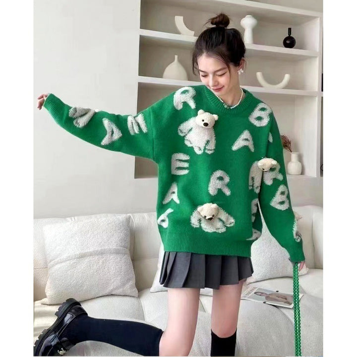 Soft knit sweater with removable bear motif