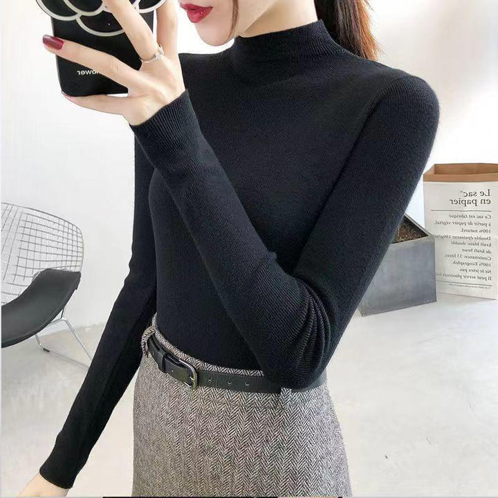Women's knitted pullover with stand-up collar, slim fit
