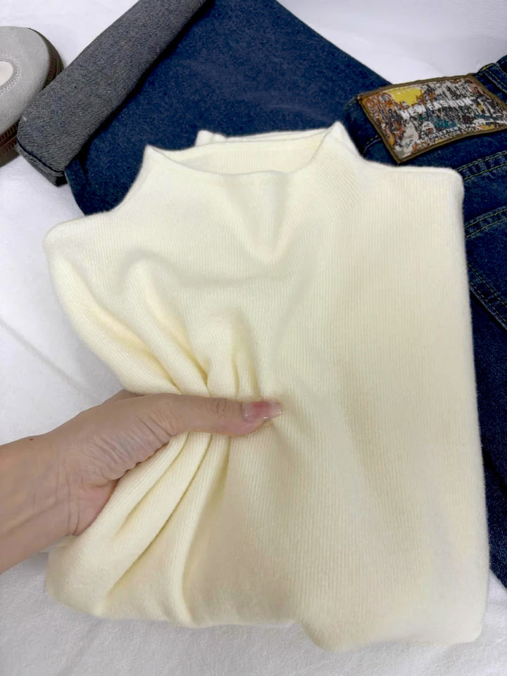 Ladies knitted pullover with stand-up collar, lined