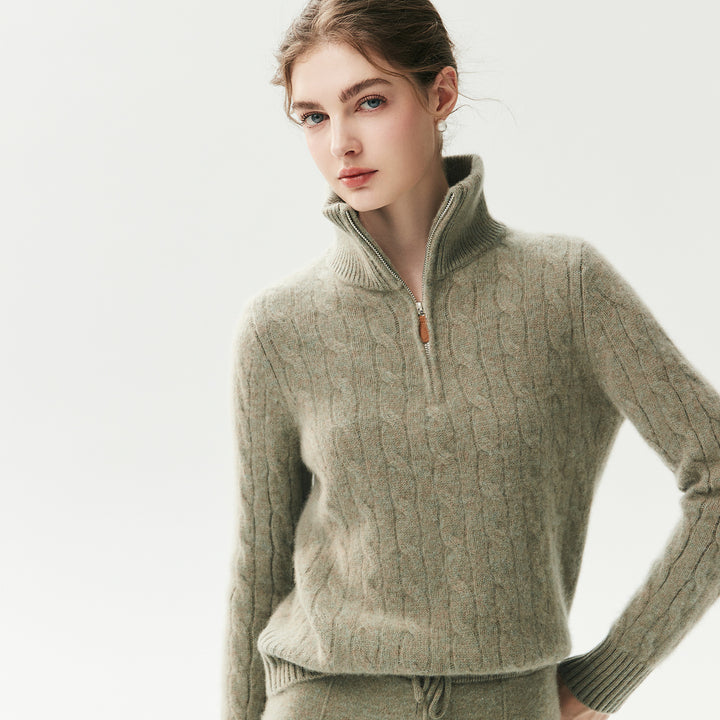 Women's knit sweater with zipper and cable pattern