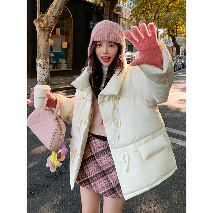 Short women's padded jacket in oversized look with toggle buttons