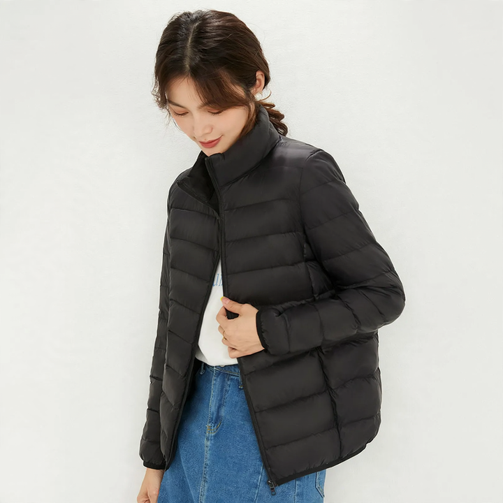 Light women's down jacket with stand-up collar, white duck down