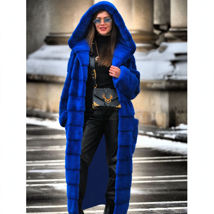 Long women's coat in faux fur with hood and padding