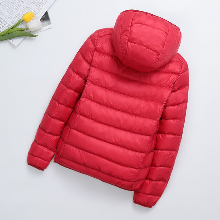 Light women's quilted jacket, short, with hood