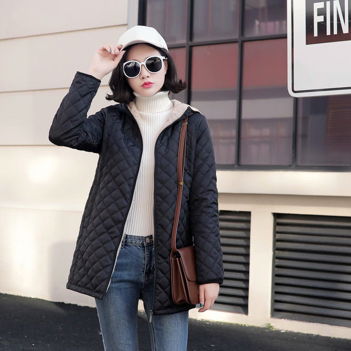 Women's quilted coat with hood and lambskin look