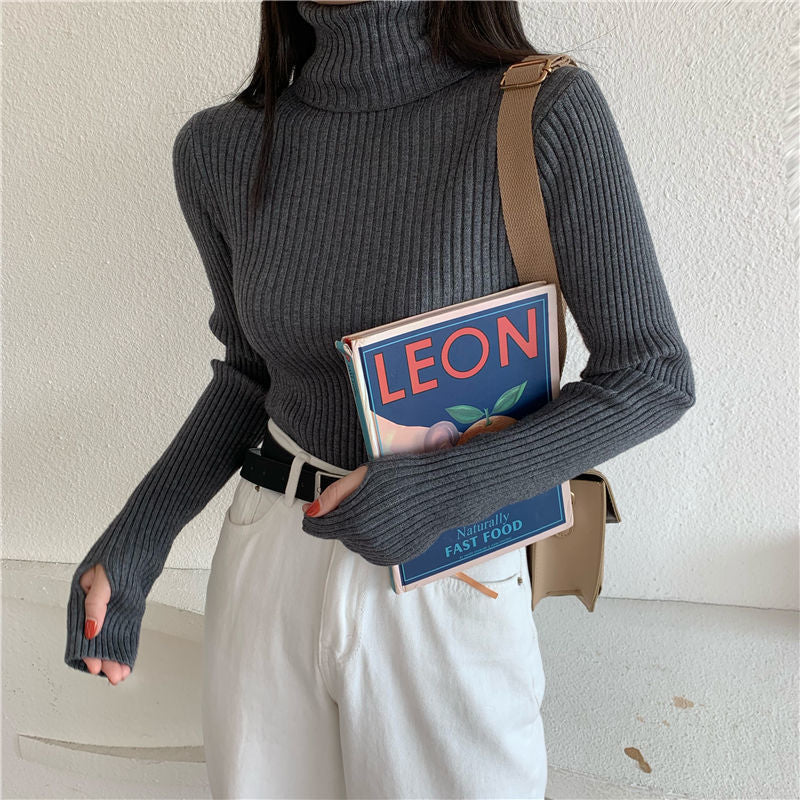 Figure-hugging turtleneck sweater with thumbholes