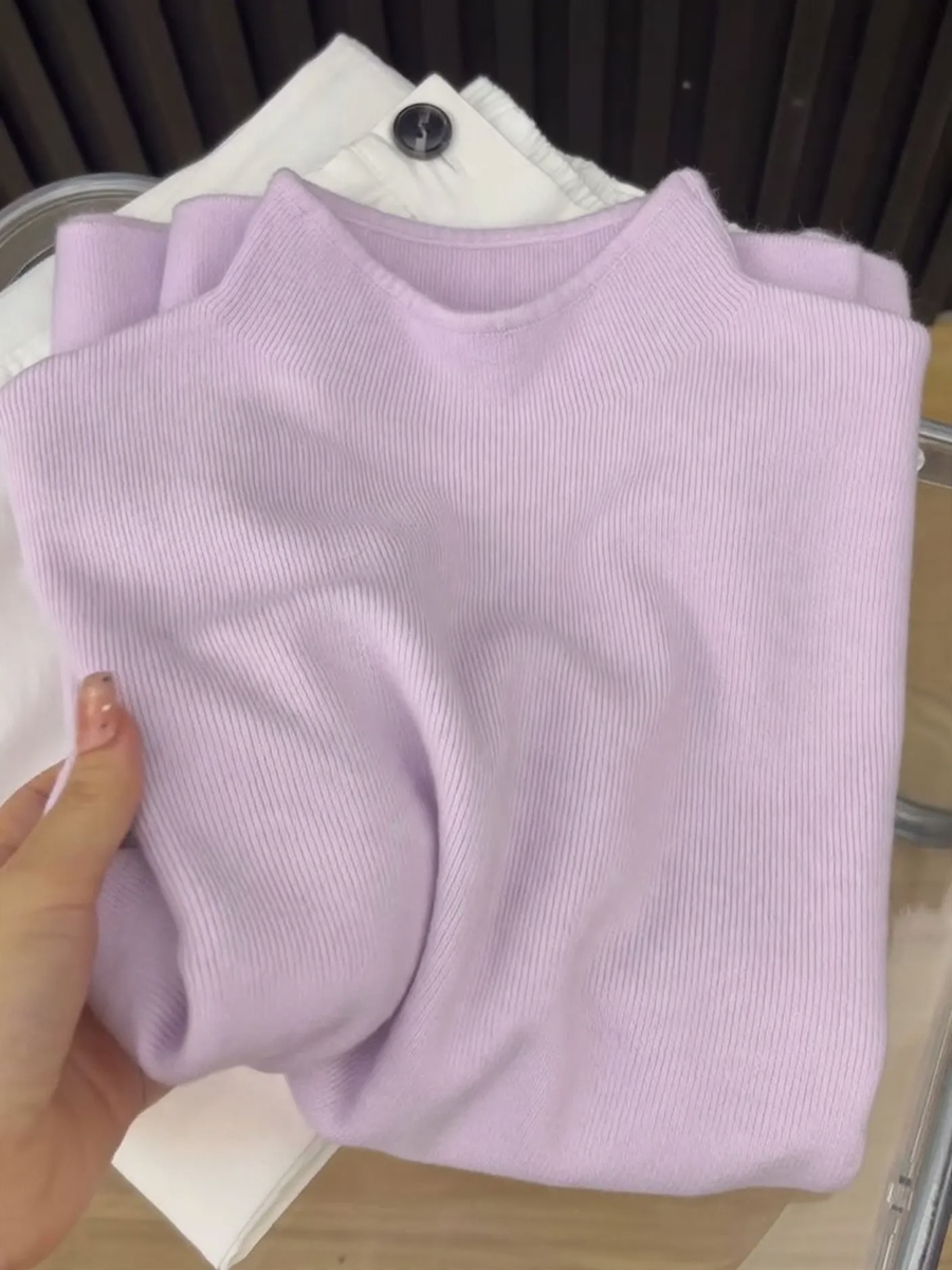 Women's knit pullover with stand-up collar, soft material