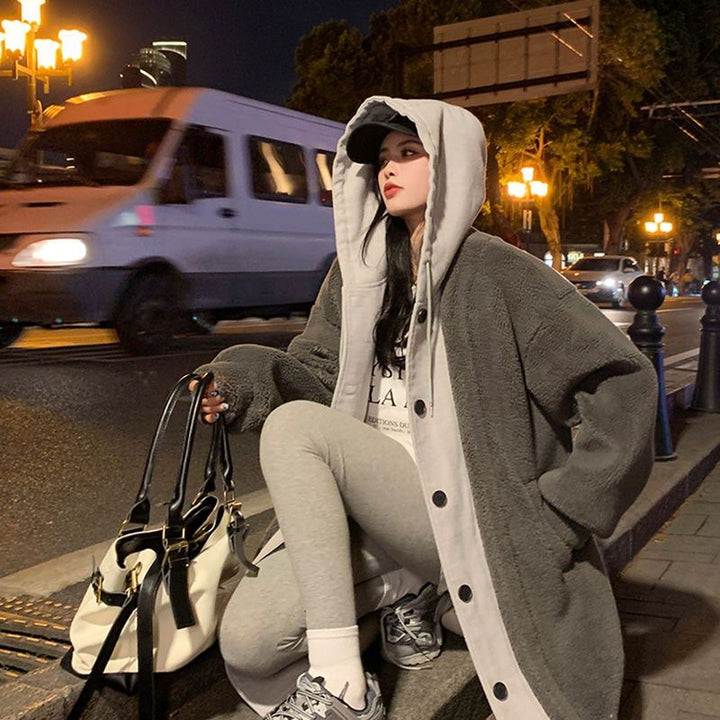 Long women's hooded jacket made of lamb fleece imitation