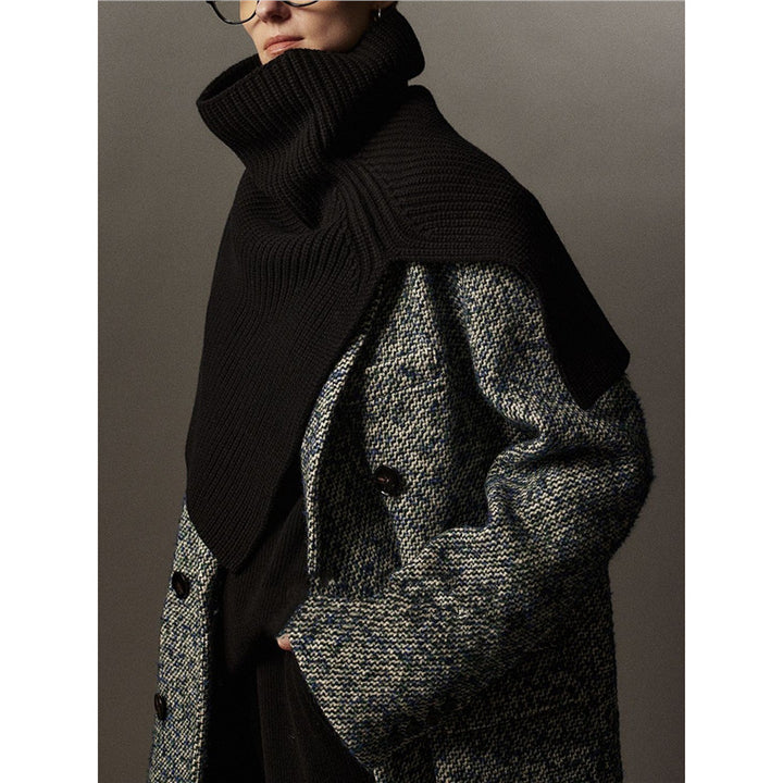 Knitted shoulder warmer made of merino wool with slit