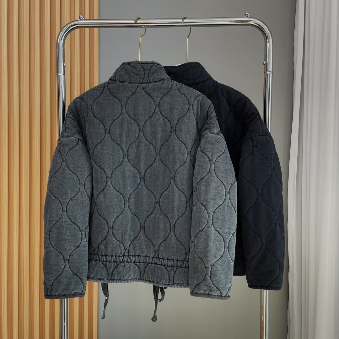 Women's quilted jacket with standing collar and tie belt
