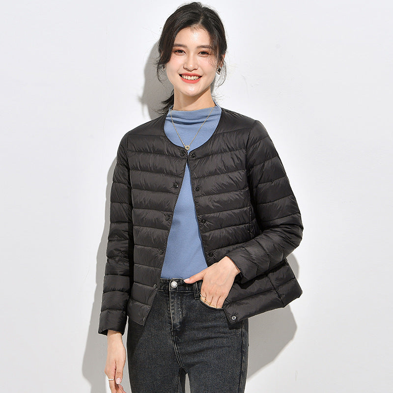 Light women's down jacket, short, as a base layer jacket