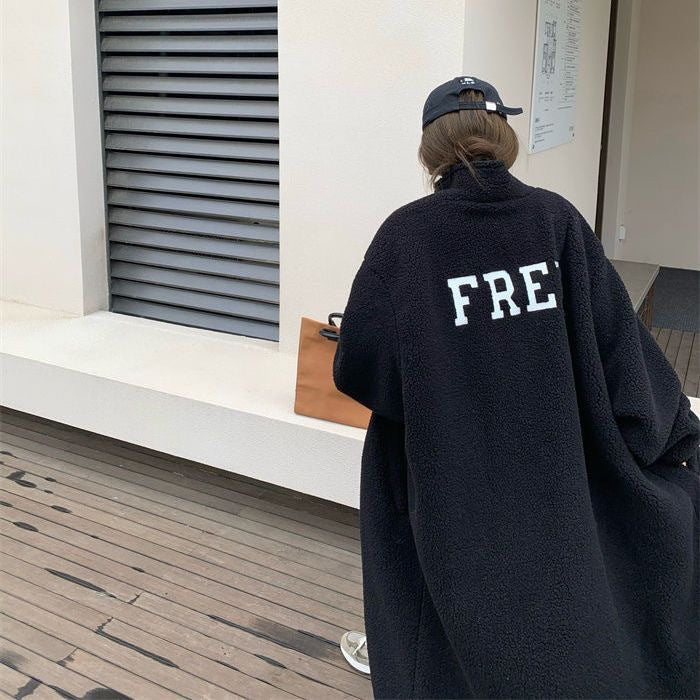 Long women's coat made of lamb fleece, stand-up collar, single-breasted