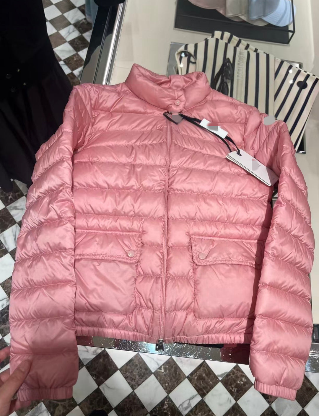 Light women's down jacket, stand-up collar, white goose down