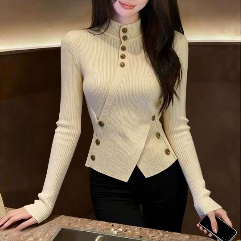 Women's knitted sweater with stand-up collar and asymmetrical cut