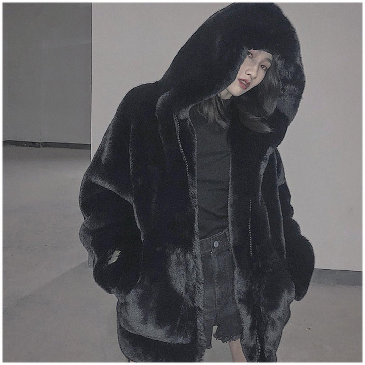 Loose faux fur coat with hood for women