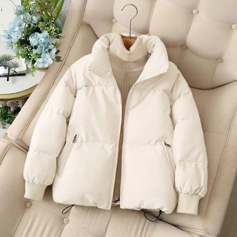 Short women's winter jacket with ribbed cuffs