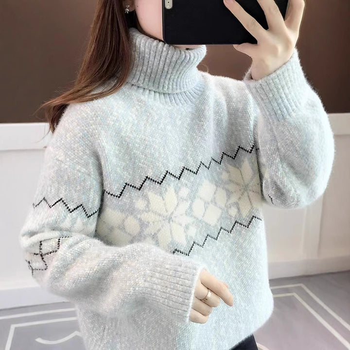 Women's knitted pullover with snowflake pattern and stand-up collar