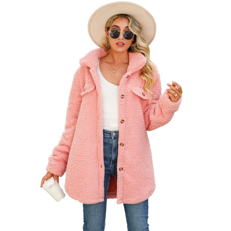 Long women's coat made of soft plush with notched collar