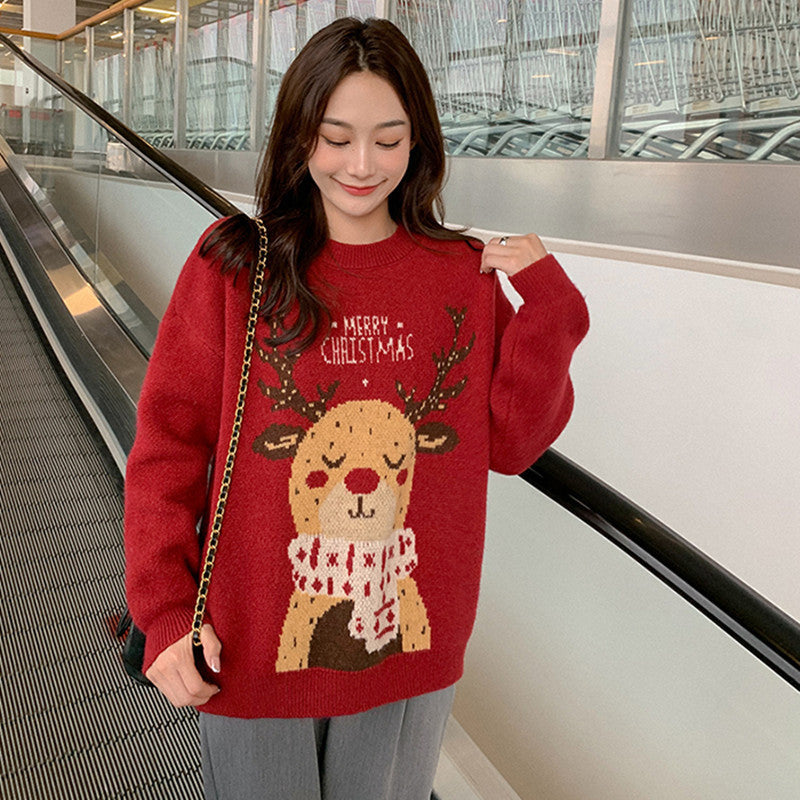 Loose women's Christmas sweater with reindeer motif