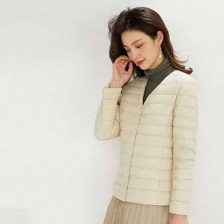 Light women's down jacket with 90% white duck down filling