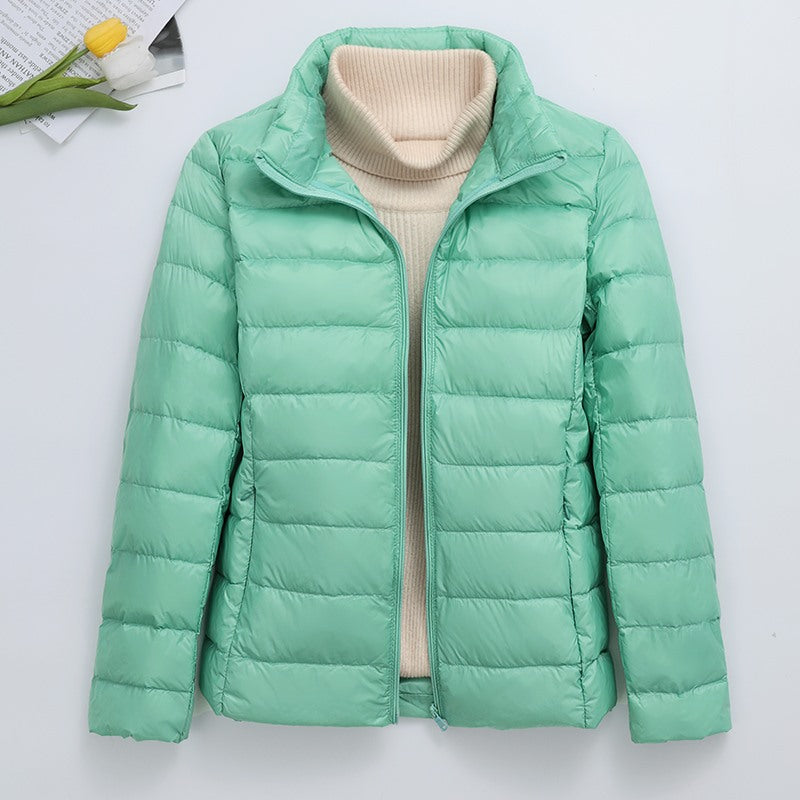 Light women's quilted jacket, short, with hood
