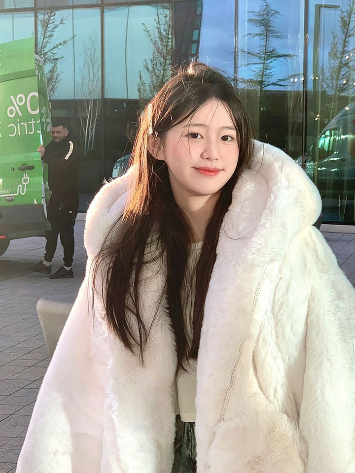 Mid-length coat with hood made of lamb fleece imitation