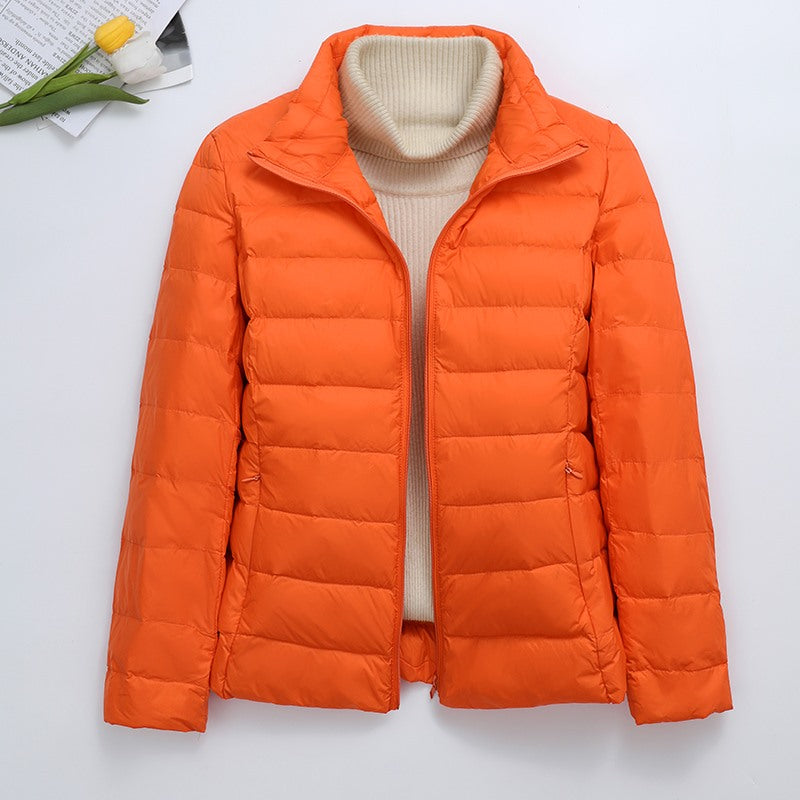 Light women's quilted jacket, short, with hood