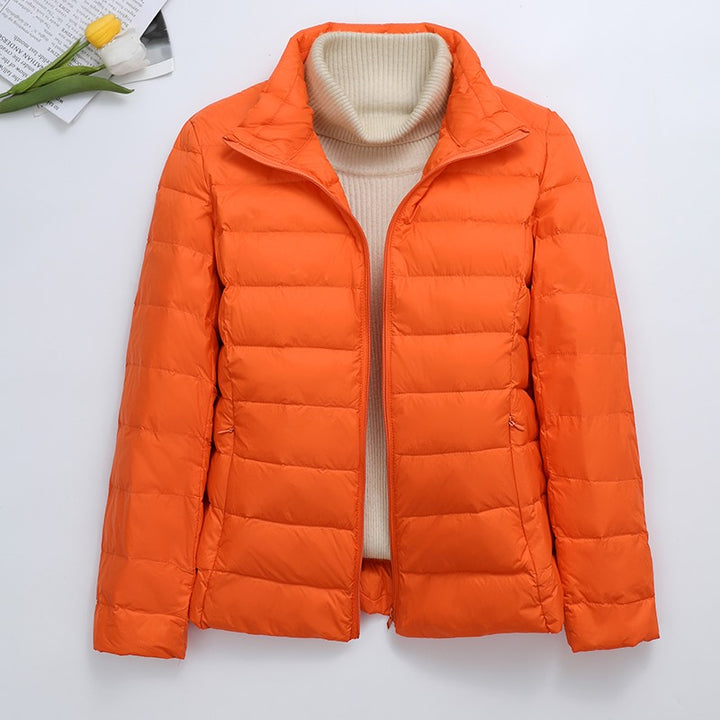 Light women's quilted jacket, short, with hood