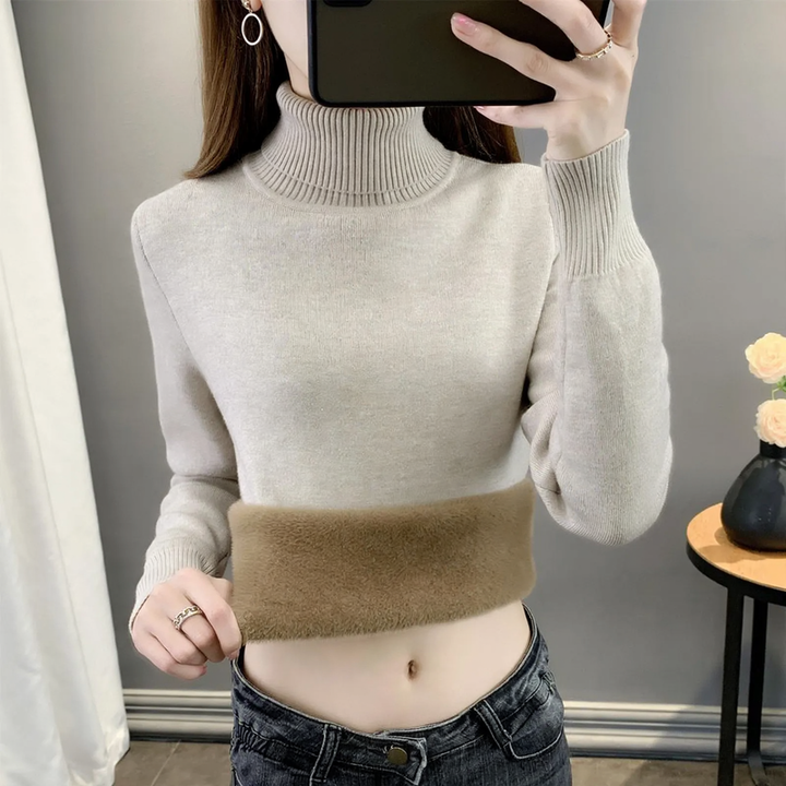 Padded women's knitted sweater for winter