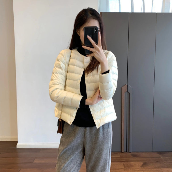 Light women's down jacket, short, with goose feathers