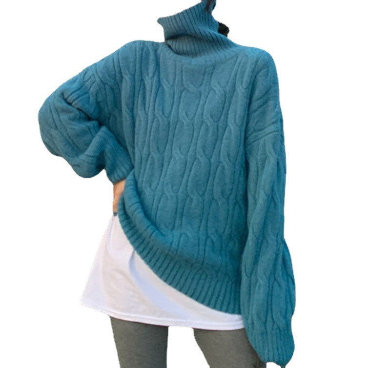 Women’s knit sweater with cable pattern and roll neck