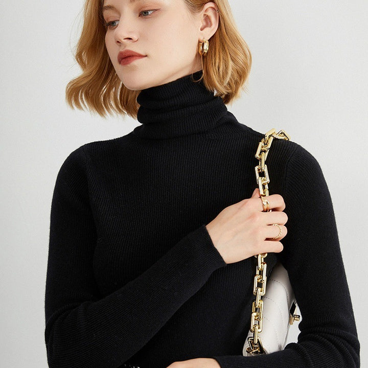Women's knitted sweater, fitted, with stand-up collar