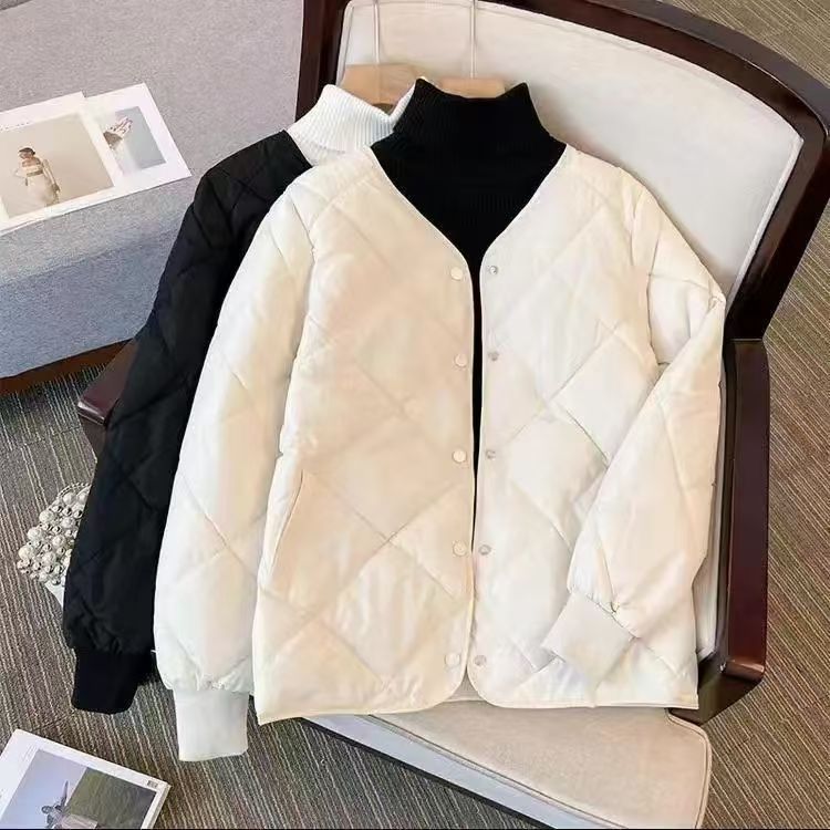 Short, quilted women's jacket with round neck