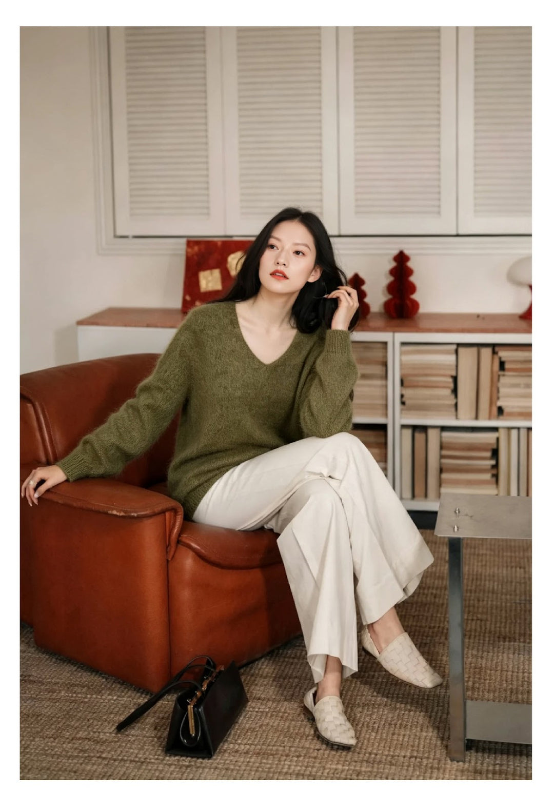 Women's knit sweater made of wool blend with V-neck