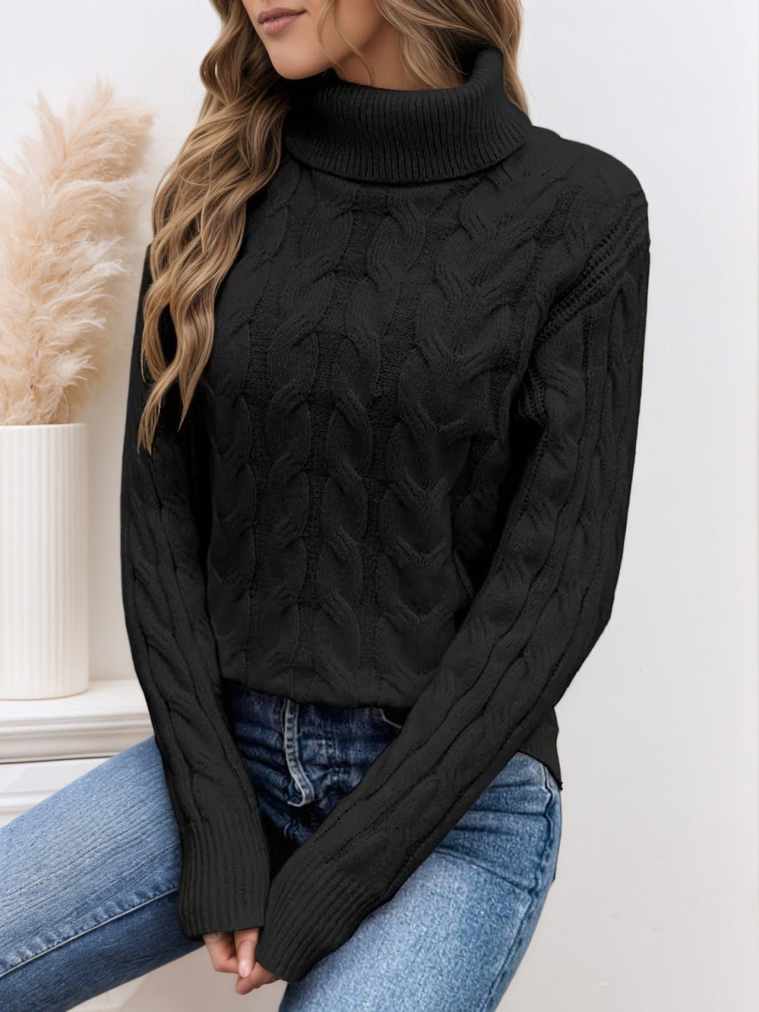 Knit sweater with cable pattern and high collar