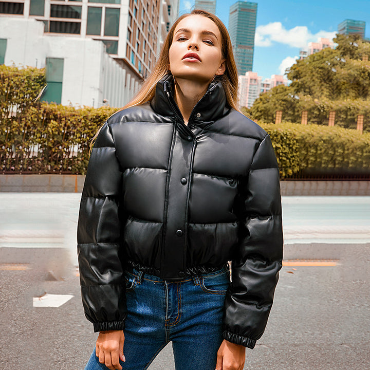 Short women's quilted jacket with stand-up collar, padded