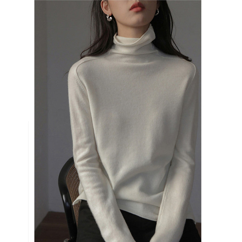 Women's wool sweater, stand-up collar, loose fit with slit