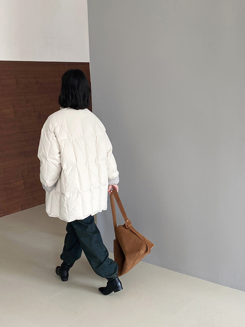 Reversible down jacket with stand-up collar