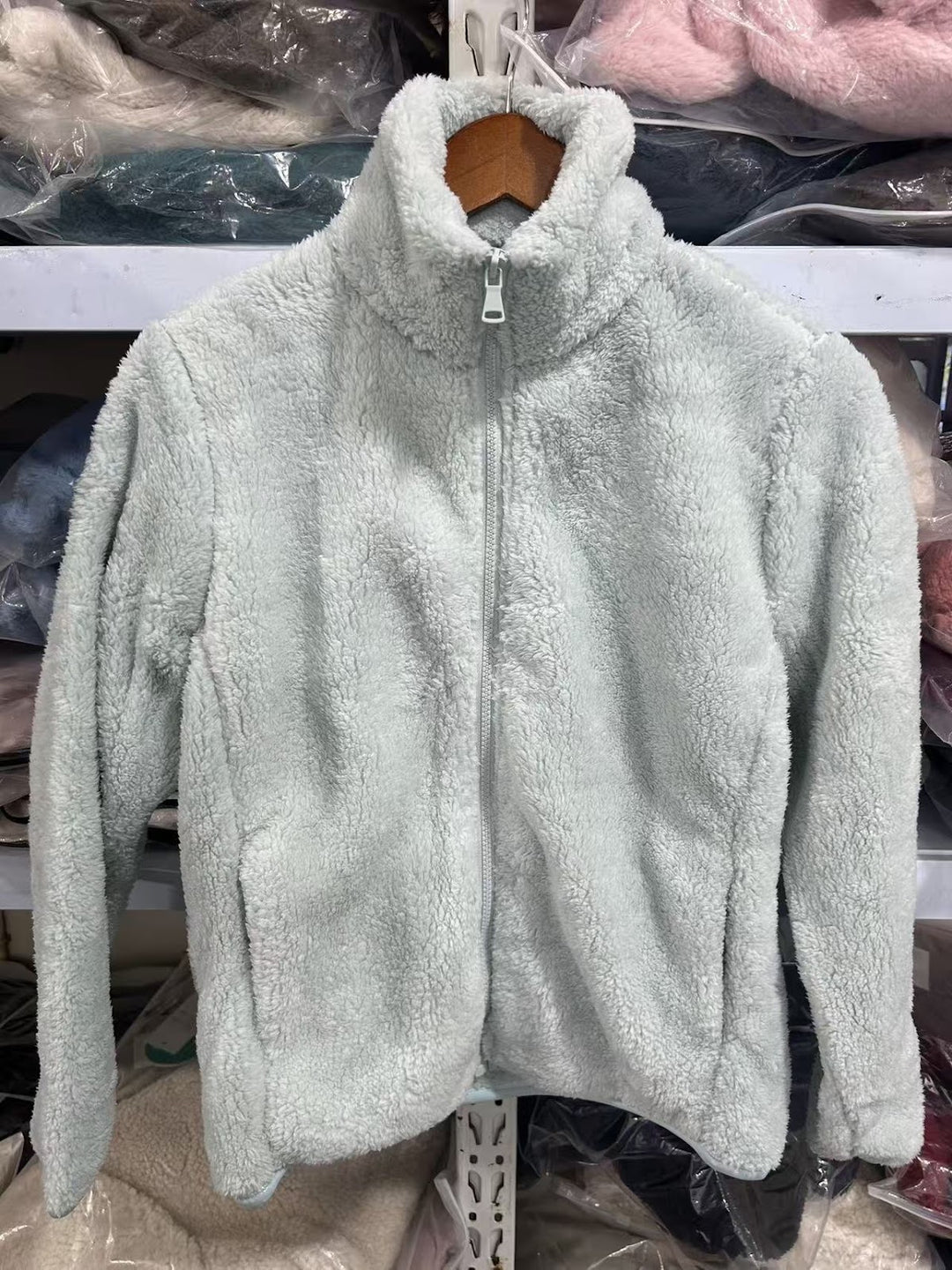 Fleece jacket with stand-up collar and zipper